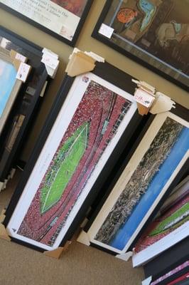 A lot of stadium photos already professionally framed