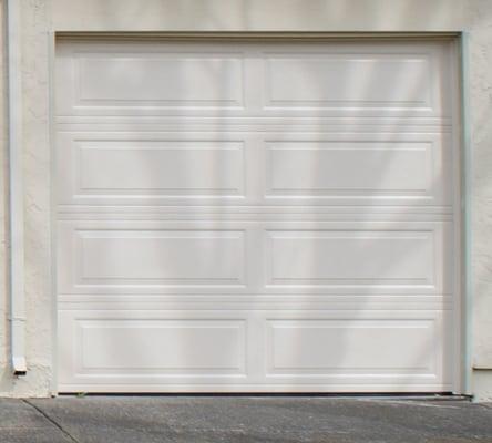 AFTER, what  a difference.  these doors have made our garage quieter, cleaner and warmer.