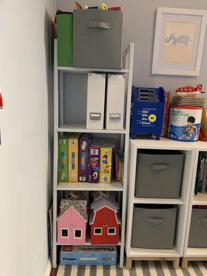 Toy closet with tons of options to keep kids engaged and make the work feel like play.