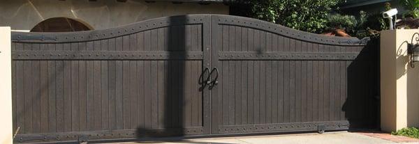 Hand Built Gates in Wood - Steel              By: Door-O-Matic