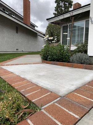 Brick and cement side walk