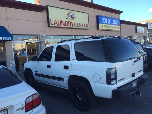 My babie outside the laundromat.