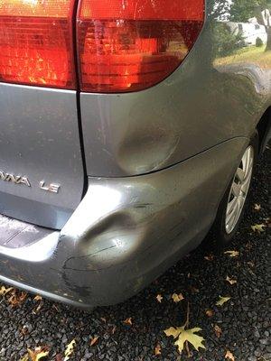 Nasty dents in rear bumper and rear quarter panel. Had a few other dings and nasty scratches that I do not have photos of but were repaired.