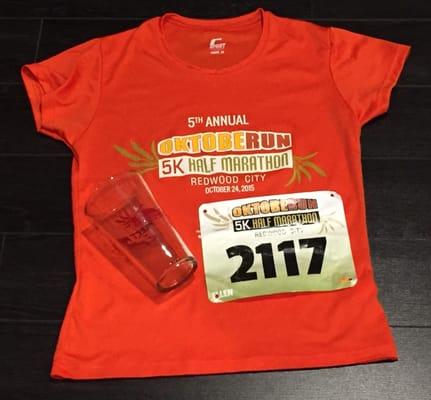 finisher's t-shirt, 5k bib, and age group winner's beer glass