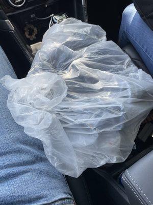 Plastic bag given to us instead of a regular guess bag