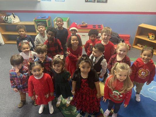 The children were patiently waiting to go preform at the Winter Holiday Program ‍