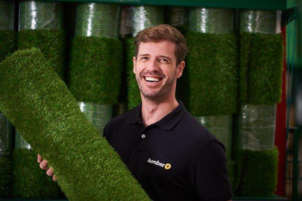 Our sales associate displaying our high quality Turf product.