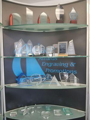 Engraved glass awards on display