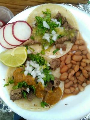 Tacos de Lengua with choice of 3 different salsas add complimentary beans and its a meal!