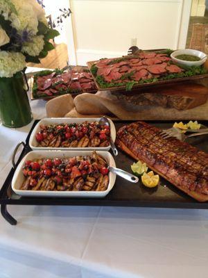 Buffet Display of sliced Filet Mignon, Chicken, Salmon