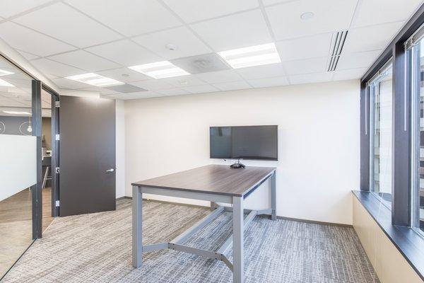 This conference room includes a standing desk