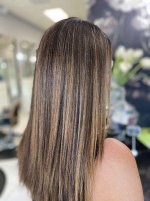 Color baby lights and balayage and that shine come from Brazilian blowout