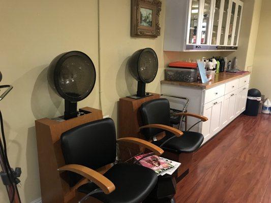 Relax in our new dryer chairs while your hair processes.