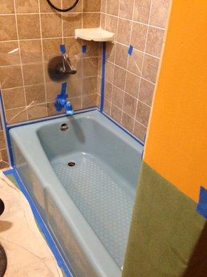 Outdated blue tub.