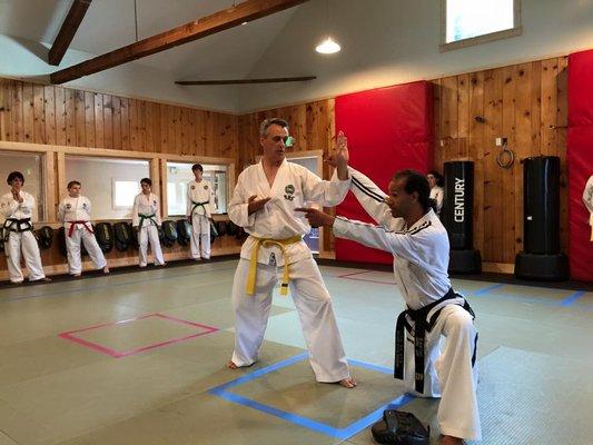 Master Alvin Bernard showing the knife hand techniques