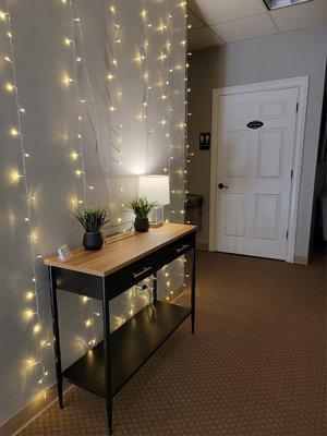 Main hallway and gender-neutral restroom.