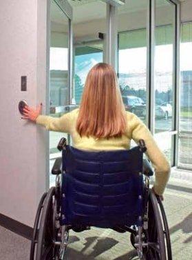 Handicap door operator in use