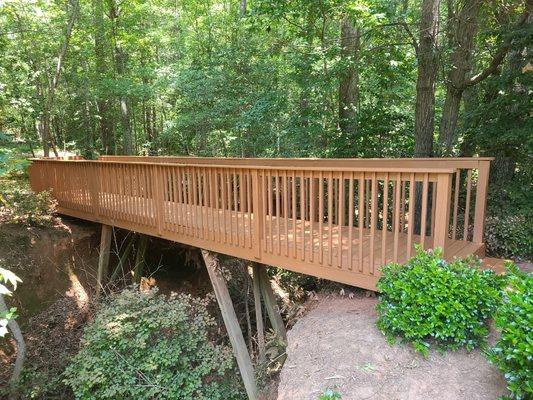 Neighborhood bridge Renovation and new coat of stain