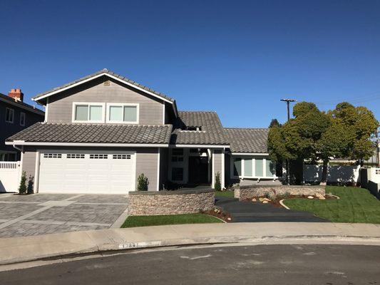 Front of the house, cracked cement driveway replaced with pavers!