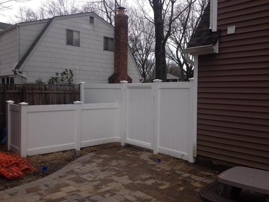 Solid PVC/Vinyl with standard 48" walk gate and, 4' PVC/Vinyl pool filter enclosure.