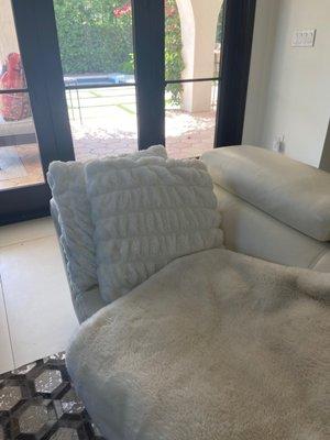 white faux fur pillows and blanket!