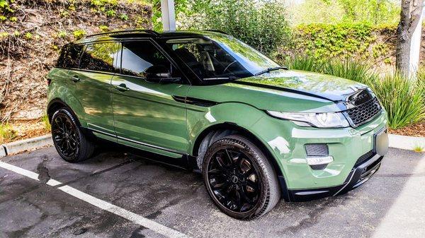 Wrapped in glossy military green, glossy black on the hood, and glossy black powder-coated wheels.