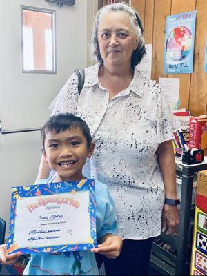 PreK graduation with grandma