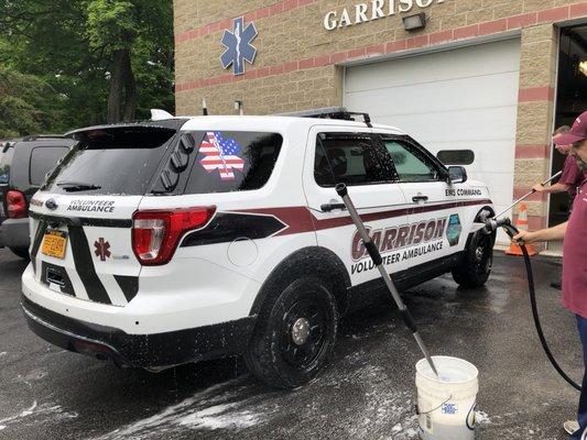 Flycar and 32-71 getting washed for the Memorial Day parade yesterday