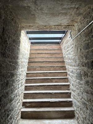 Stairs from ground level to underground tombs.