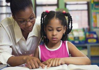 Speech and Language Therapist working with a child