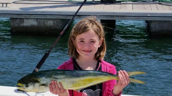 Fun day on the water for this young girl, her first mahi