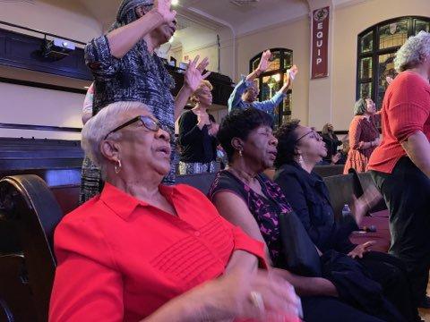 Members praying at Corporate Prayer Night