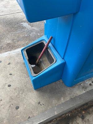 Nasty brown windshield cleaner station