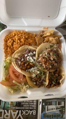 2 taco combo with 2 extra tacos: asada, carnitas, barbacoa, y cabeza