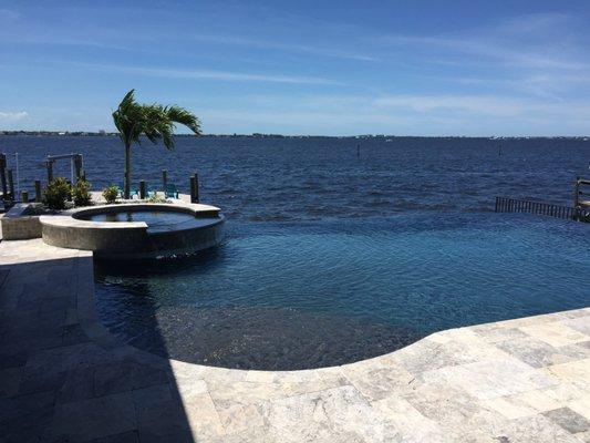 Infinity pool for a custom home on the river.