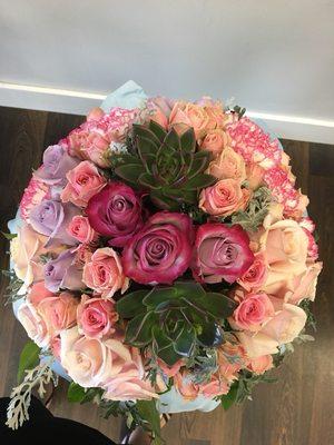 Beautiful centerpiece with succulents and roses