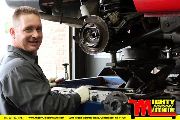 Brakes being serviced by our expert.