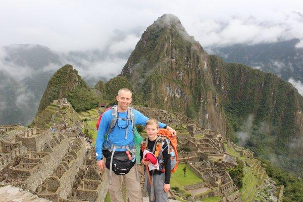 Dr. Allen with son in Peru doing a dental mission