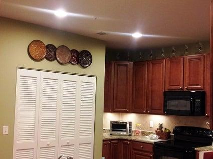 The wall color is of primary importance, even in an area like a kitchen, which has plenty of objects covering the walls.