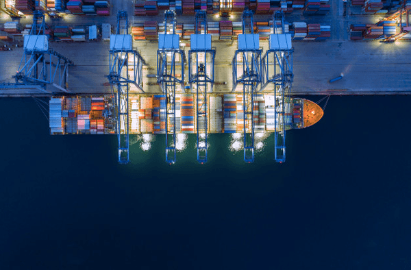 Beautiful ship getting loaded with cargo containers