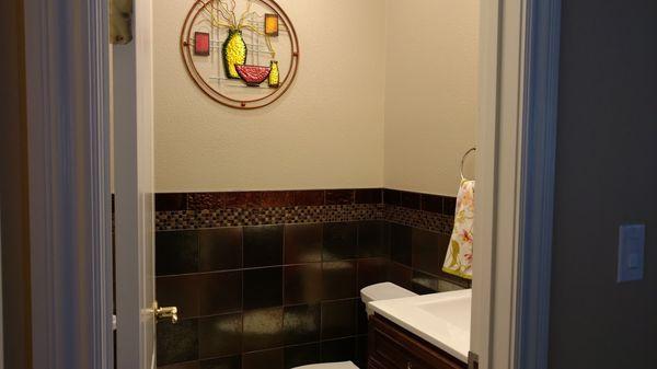 The tile when installed in powder room.