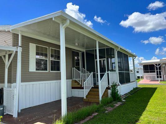 Carport,screen room and deck