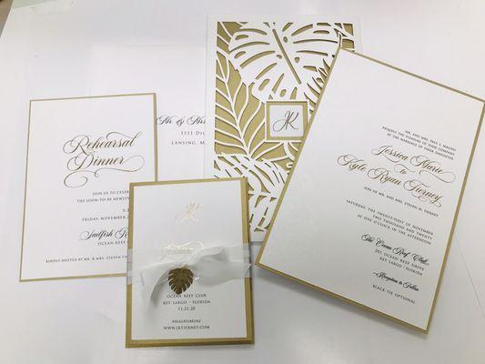 Laser cut gold and white wedding invitation suite