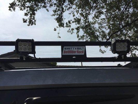 Floodlights mounted on roof rack