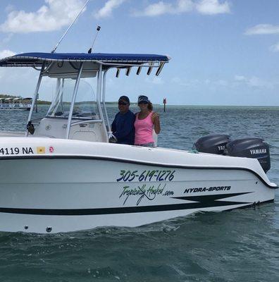 Captain Scott and Keri aboard Tropically Hooked