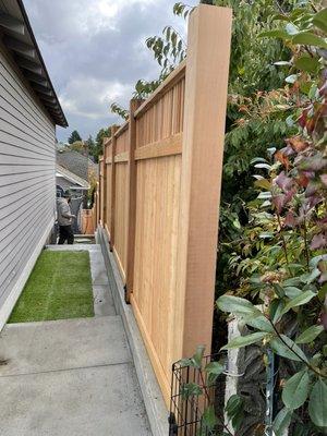 Custom cedar fence with 6x6 posts and 1x2 top lattice