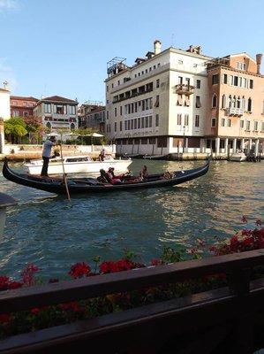 Cruise down the river in a gondola ride in Venice.