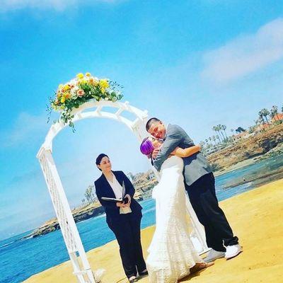 Rev. Poblano pronouncing the happy couple as husband and wife at Sunset Cliffs.