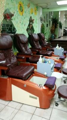 luxurious pedicure chair station with built in massage chairs