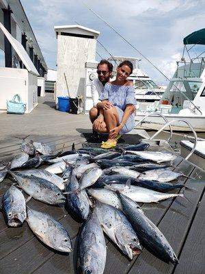 Happy customers score a bounty of Black Fin Tuna and Bonita Fish on a 6 hour offshore fishing charter